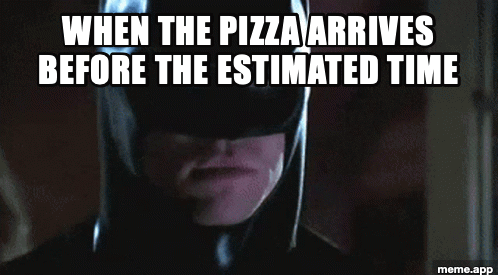 Batman Smiles GIF reacting to pizza arriving early