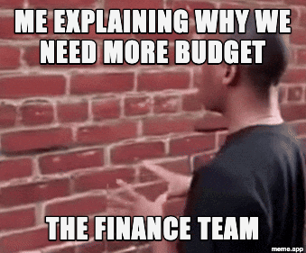 Talking To Wall GIF about explaining budget needs to the finance team