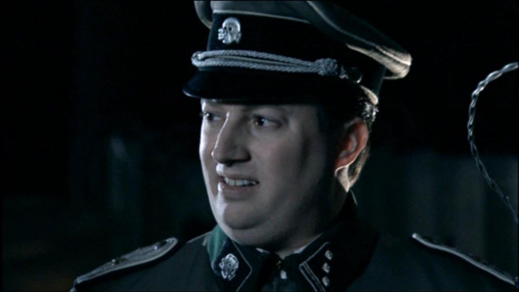 Are We The Baddies meme template - Two German soldiers in a British comedy sketch look at each other in a moment of dawning realization. The joke is that they a