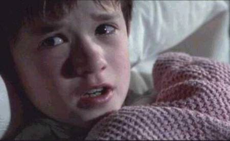 I See Dead People meme template - Haley Joel Osment as young Cole Sear from The Sixth Sense, his face a picture of quiet terror. Wide eyes, lips slightly parte