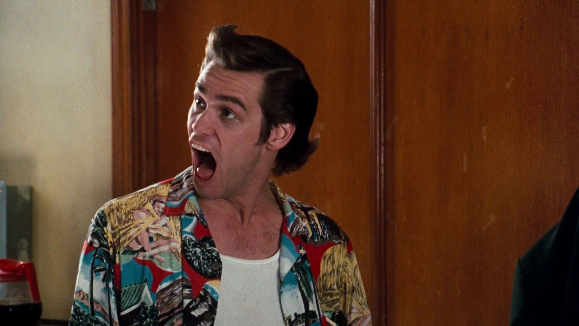 Jim Carrey Alrighty Then meme template - Jim Carrey as Ace Ventura from Ace Ventura: Pet Detective, standing in a doorway with his mouth stretched open to a physicall