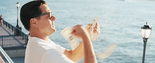 Leo Throwing Money GIF meme template