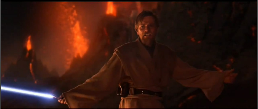 Obi Wan High Ground meme template - Ewan McGregor as Obi-Wan Kenobi on the volcanic planet Mustafar. He stands on rocky terrain with molten lava glowing orange a