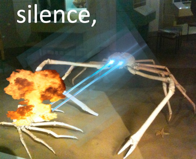 Silence Crab meme template - A fiddler crab with one claw so disproportionately large it appears to be raised in formal command. The claw points upward wi
