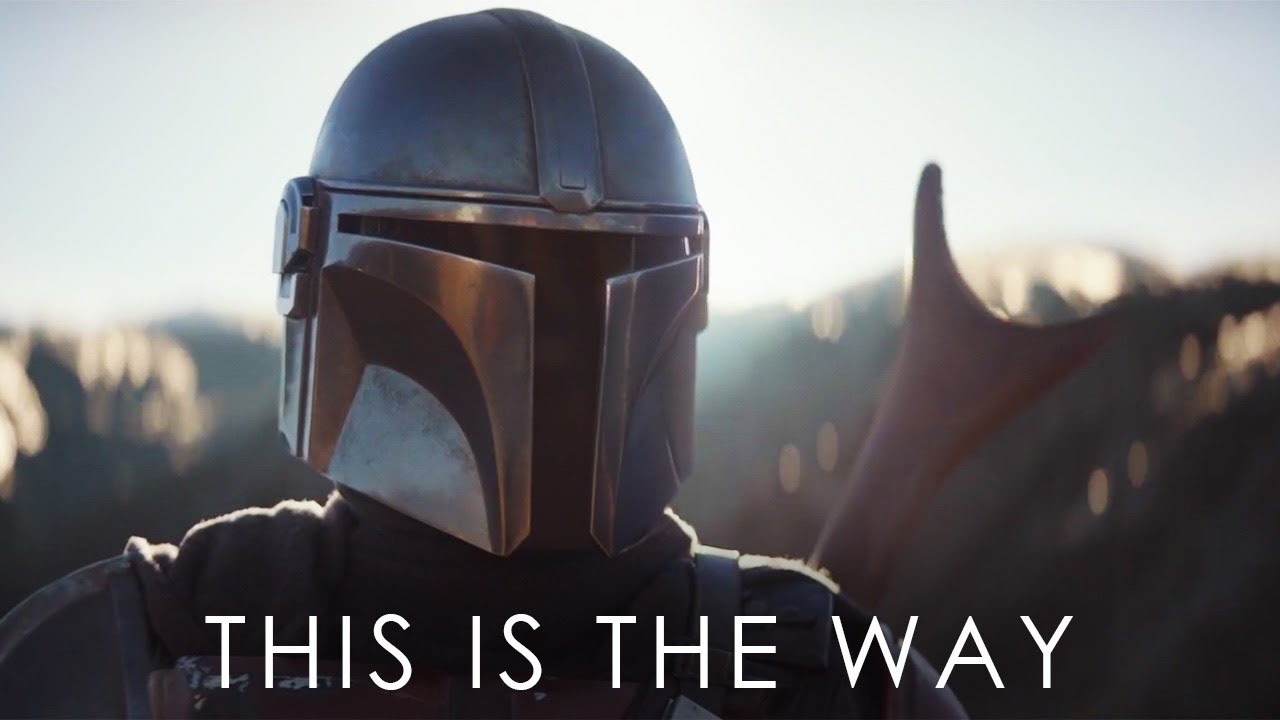 This Is The Way meme template - The Mandalorian, Din Djarin, fills the frame from the shoulders up in his full beskar steel helmet, T-shaped visor reflecting