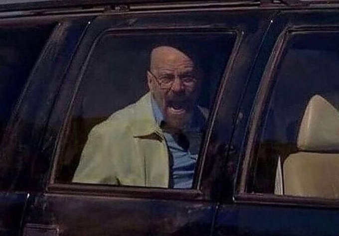 Walter White Screaming At Hank meme template - Bryan Cranston as Walter White, face contorted in rage, screaming at Dean Norris as Hank Schrader. Walter's mouth is wide ope