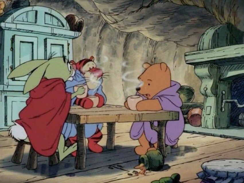 Winnie The Pooh Friends Table meme template - A warm screenshot from Winnie the Pooh showing Pooh Bear, Rabbit, and Tigger at a small round table, each wrapped in a cozy b